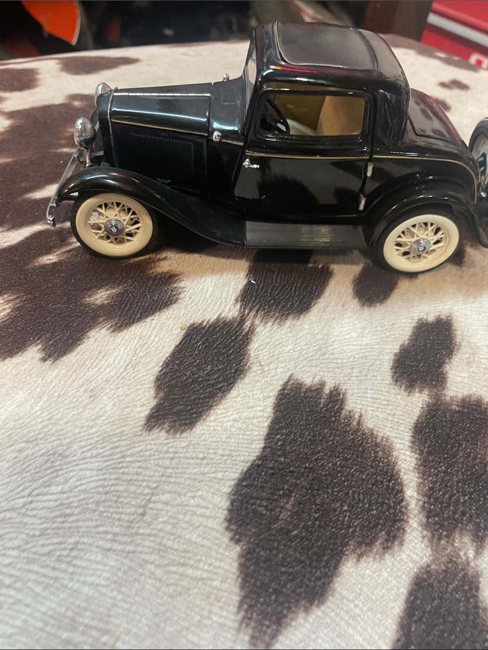 Franklin Mint Black Coupe with Cream Wheels and Interior